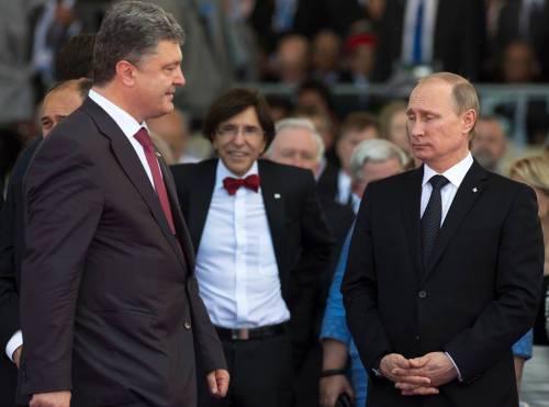 Final de război la graniţa României? Acord Putin-Poroşenko