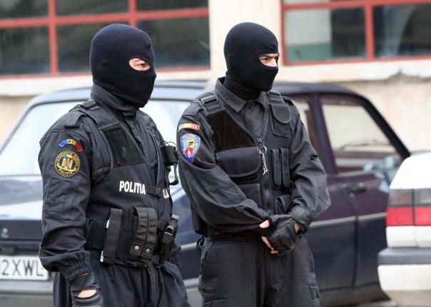 Percheziţii la Cluj într-o anchetă privind o platformă 