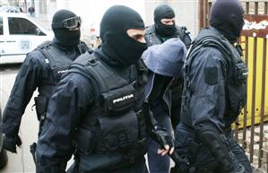 Percheziții în trei județe din țară, după o crimă petrecută în 2014