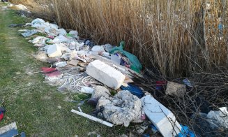 Groapă de gunoi pe malul Someşului. Floreştenii, chemaţi la curăţeni