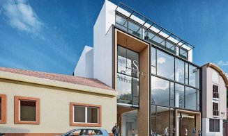 Clădire de birouri inserată între case pe Traian Moșoiu. Zona e în restructurare urbană