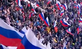 Cinism barbar la Moscova: Putin citează din Biblie la un CONCERT cu sute de mii de oameni pe stadion, în timp ce armata lui omoară civilii pe capete î