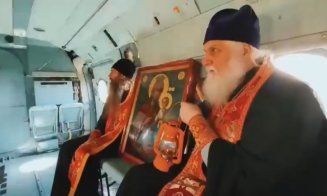Rușii cer ajutor din cer. Preoți, icoane și Lumina Sfântă, zbor cu elicopterul militar deasupra regiunii Belgorod