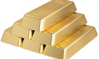Preţul aurului atinge  un maxim istoric, leul se depreciază faţă de euro şi dolar