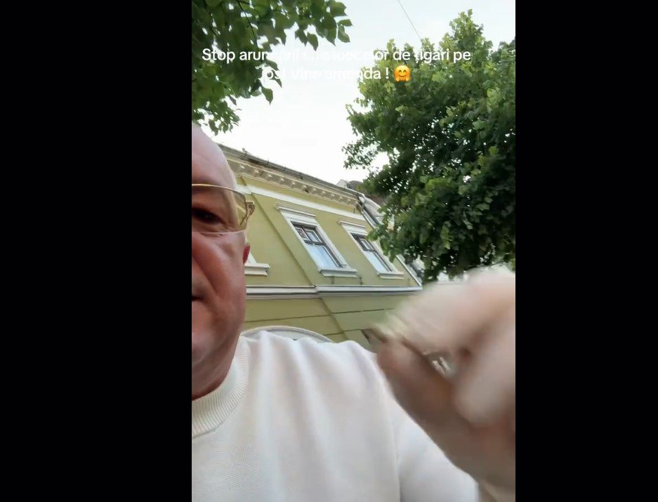 Primarul Boc, la strâns mucurile de țigară aruncate la rădăcina copacilor. Promite amenzi de 1.000 de lei