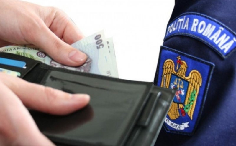 Agent de poliție din Cluj, acuzat de corupție. Cât „a costat” să închidă ochii