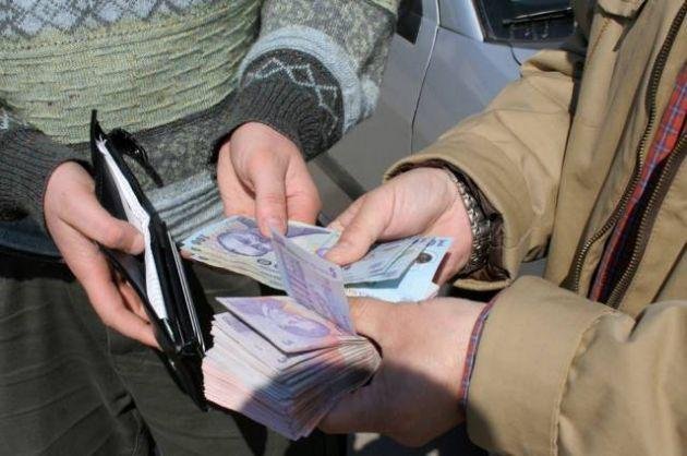 Lege nouă: Cămătarii rămân fără bani și riscă până la 5 ani de închisoare