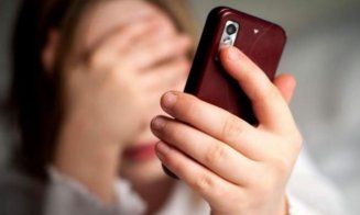 Patron din Cluj, reținut de poliție după ce ar fi amenințat o angajată să îi trimită 10.000 de lei